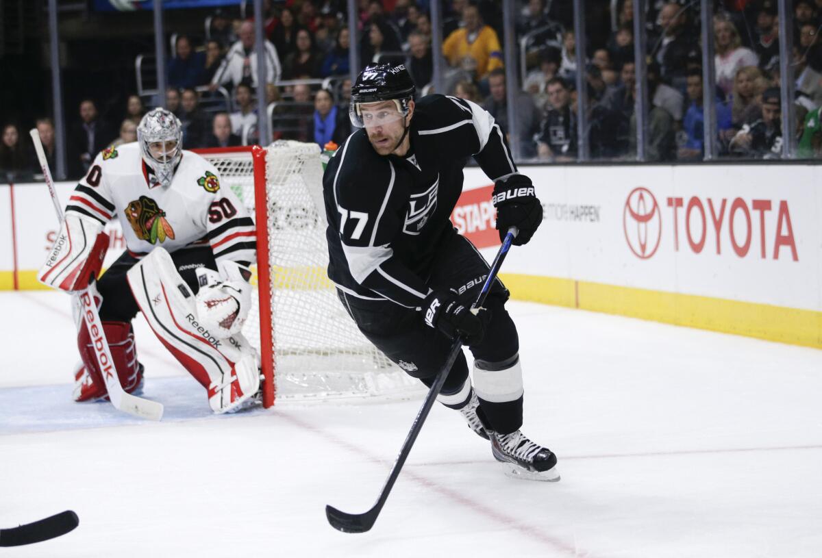 Kings center Jeff Carter looks for the puck in the Blackhawks zone earlier this season.