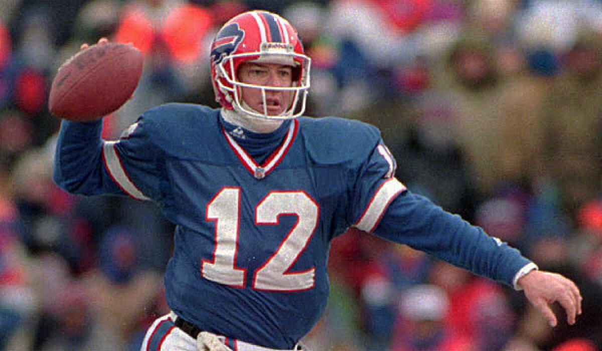 Jim Kelly, shown in 1994, led the Buffalo Bills to four straight Super Bowl appearances in the early '90s.