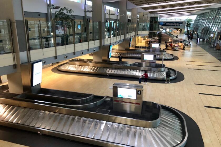 An empty baggage carousel at Terminal 2 at the San Diego International Airport on Thursday morning, March 12, 2020.