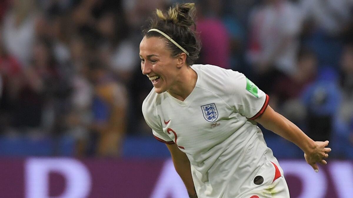 England's defender Lucy Bronze celebrates after scoring a goal during the Women's World Cup quarterfinal match between Norway and England, on Thursday in Le Havre, France.