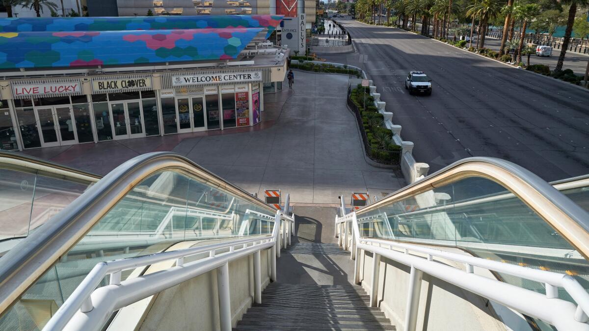 An escalator leading to the Grand Bazaar Shops and Bally’s in Las Vegas has gone quiet.