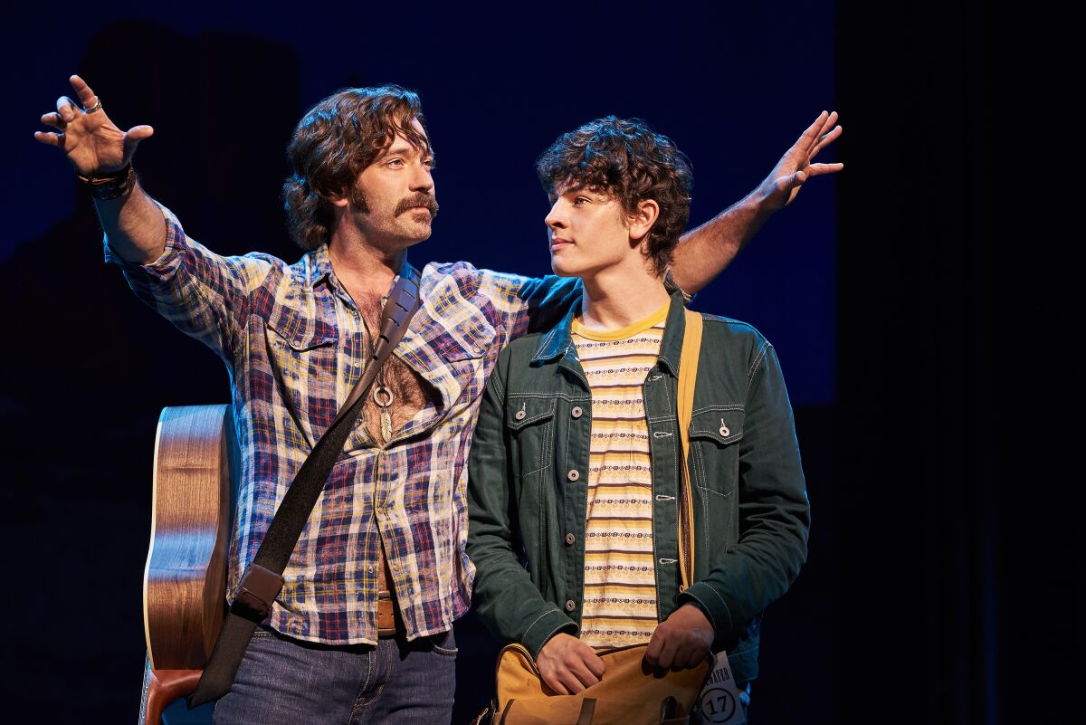 Colin Donnell (left) as Stillwater guitarist Russell Hammond and Casey Likes as journalist William Miller in the Old Globe Theatre's world-premiere production of "Almost Famous."