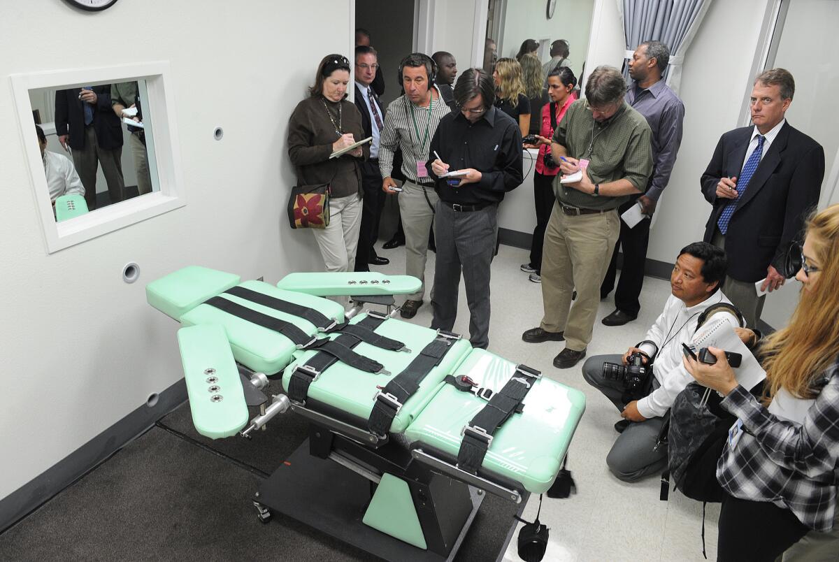 Journalists get a look inside the lethal injection chamber at San Quentin State Prison.