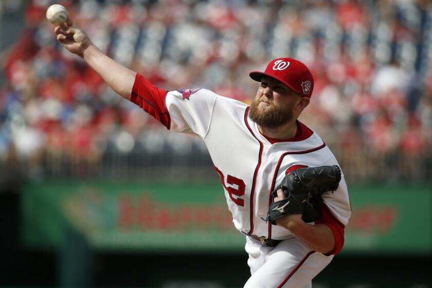 Drew Storen works in relief for the Nationals during a game against the Marlins last season.