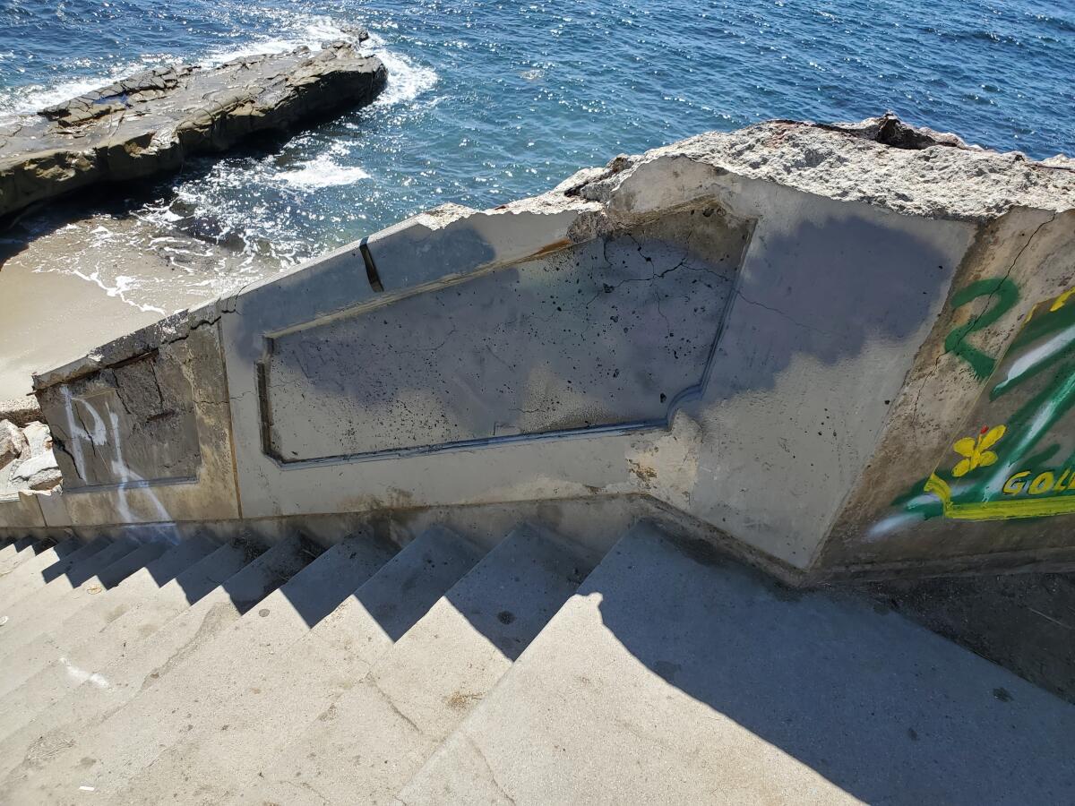 The staircase leading to the beach from Camino de la Costa was partially repainted after Nazi symbols were painted on it.
