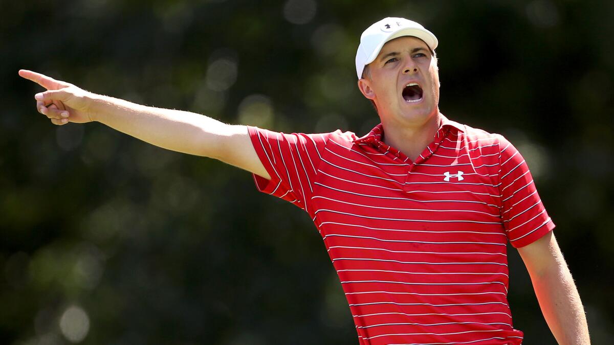 Jordan Spieth warns spectators about his wayward tee shot at No. 5 during the second round of the Barclays on Friday.