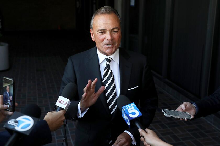 Rick Caruso fields media questions in February.