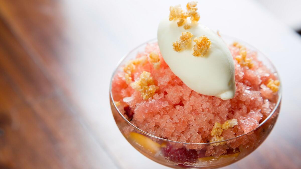 Flan, raspberries, sliced peaches, coconut gelee, caramelized rice krispies, coconut ice cream and more go into the Filipino ice cream sundae dessert halo-halo at République.