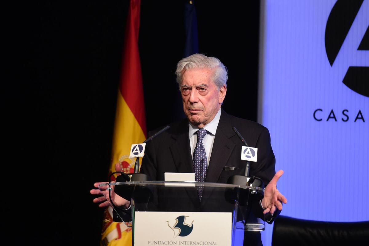 Peruvian writer and recipient of the 2010 Nobel Prize in Literature Mario Vargas Llosa delivers a speech at Casa de America in Madrid on March 29.