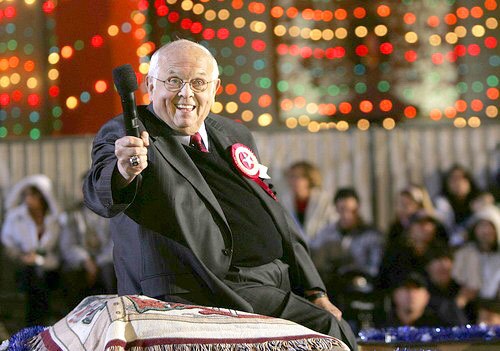 Johnny Grant, honorary mayor of Hollywood, flashes a smile in front of Grauman's Chinese Theatre during the 75th annual Hollywood Christmas Parade in 2006.
