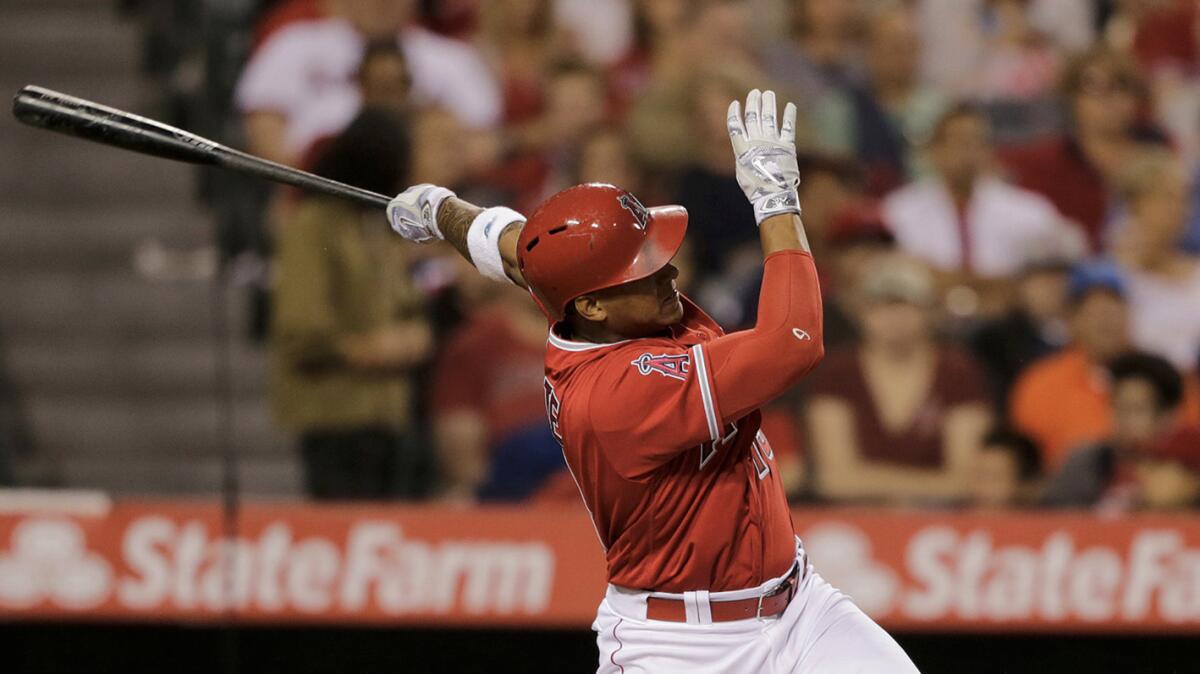 Angels third baseman Jefry Marte singles to score Mike Trout giving the Angels a 1-0 lead against the Minnesota Twins in the fourth inning on June 15.
