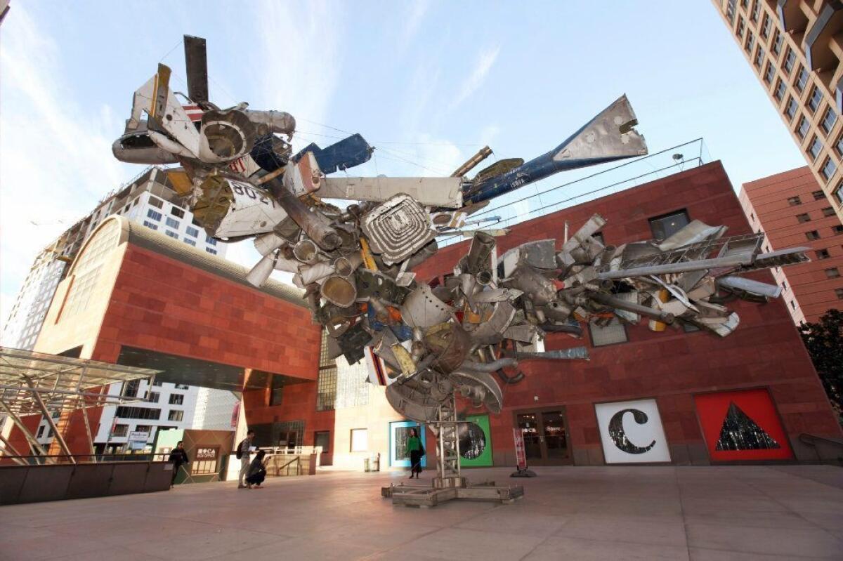 "Airplane Parts," a sculpture by Nancy Rubins made of scraps of old airplanes wired together into a massive junk tree, greets visitors to the Museum of Contemporary Art in downtown Los Angeles.