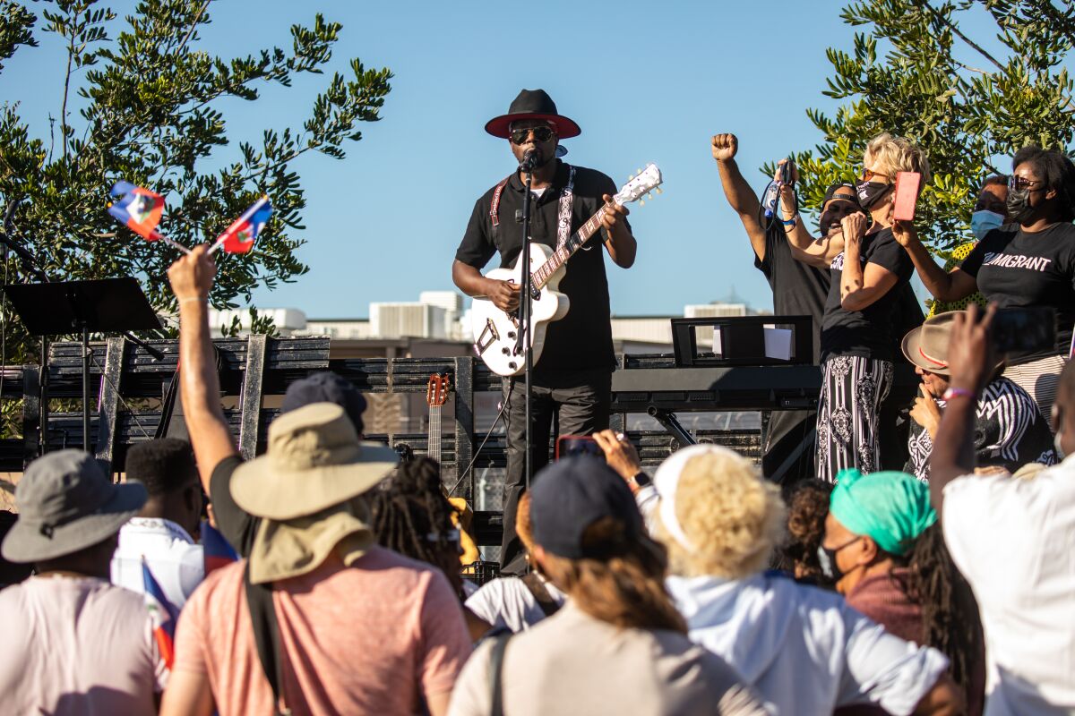 Wyclef Jean performs outside the Otay Mesa Detention Center
