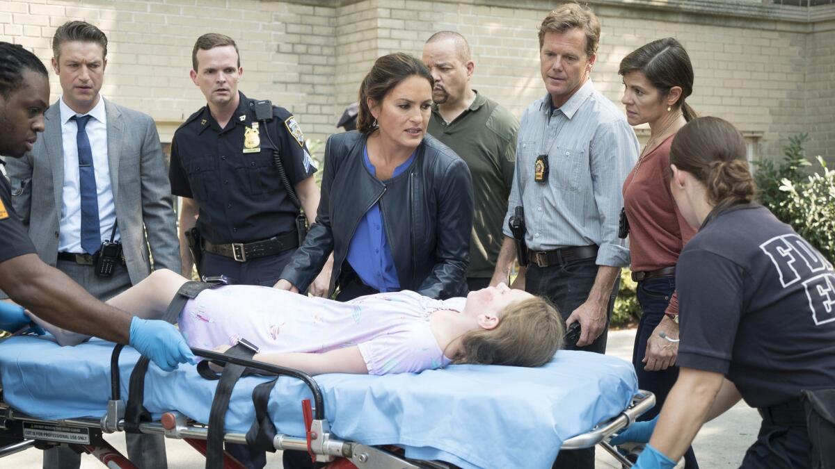 Peter Scanavino as Dominick "Sonny" Carisi, left, Mariska Hargitay as Sgt. Olivia Benson, Scott Williams as Det. "Doom," Caris Vujec as Det. Campesi in "Community Policing."