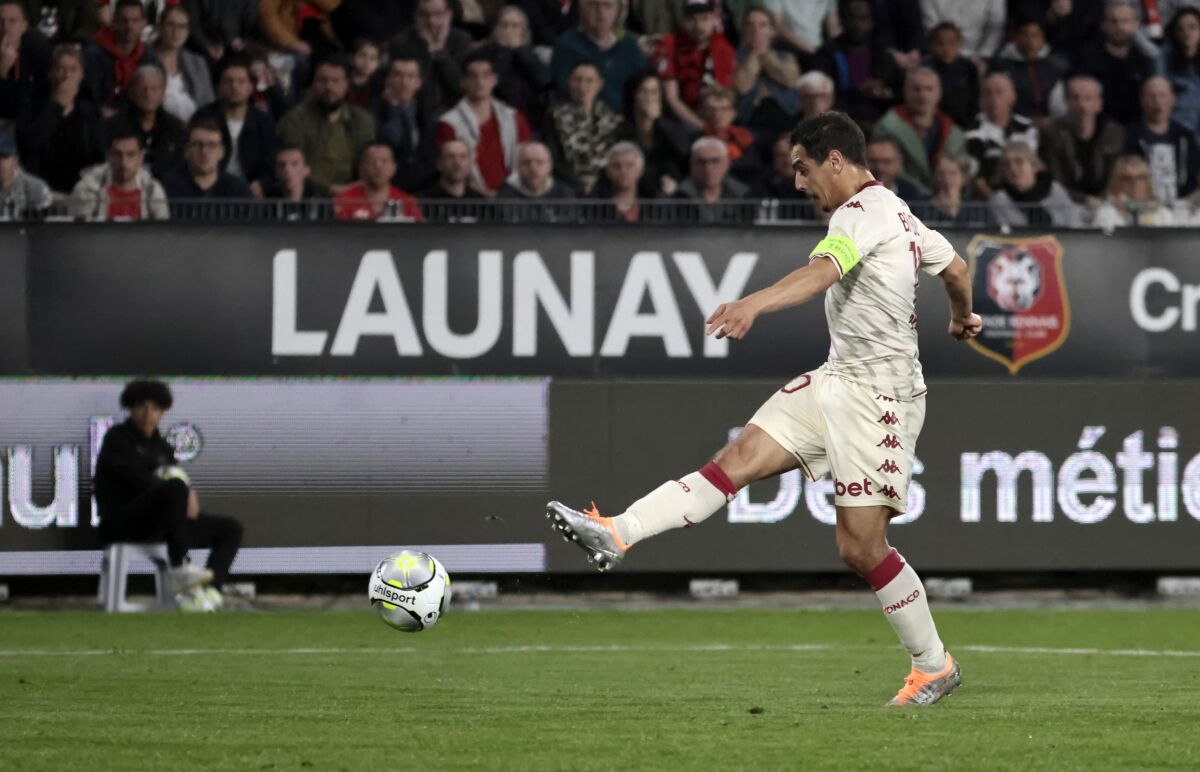 Monaco's Wissam Ben Yedder scores his side's second goal during the League One soccer match between Rennes and Monaco, at the Roazhon Park stadium in Rennes, France, Friday, April 15, 2022. (AP Photo/Jeremias Gonzalez)