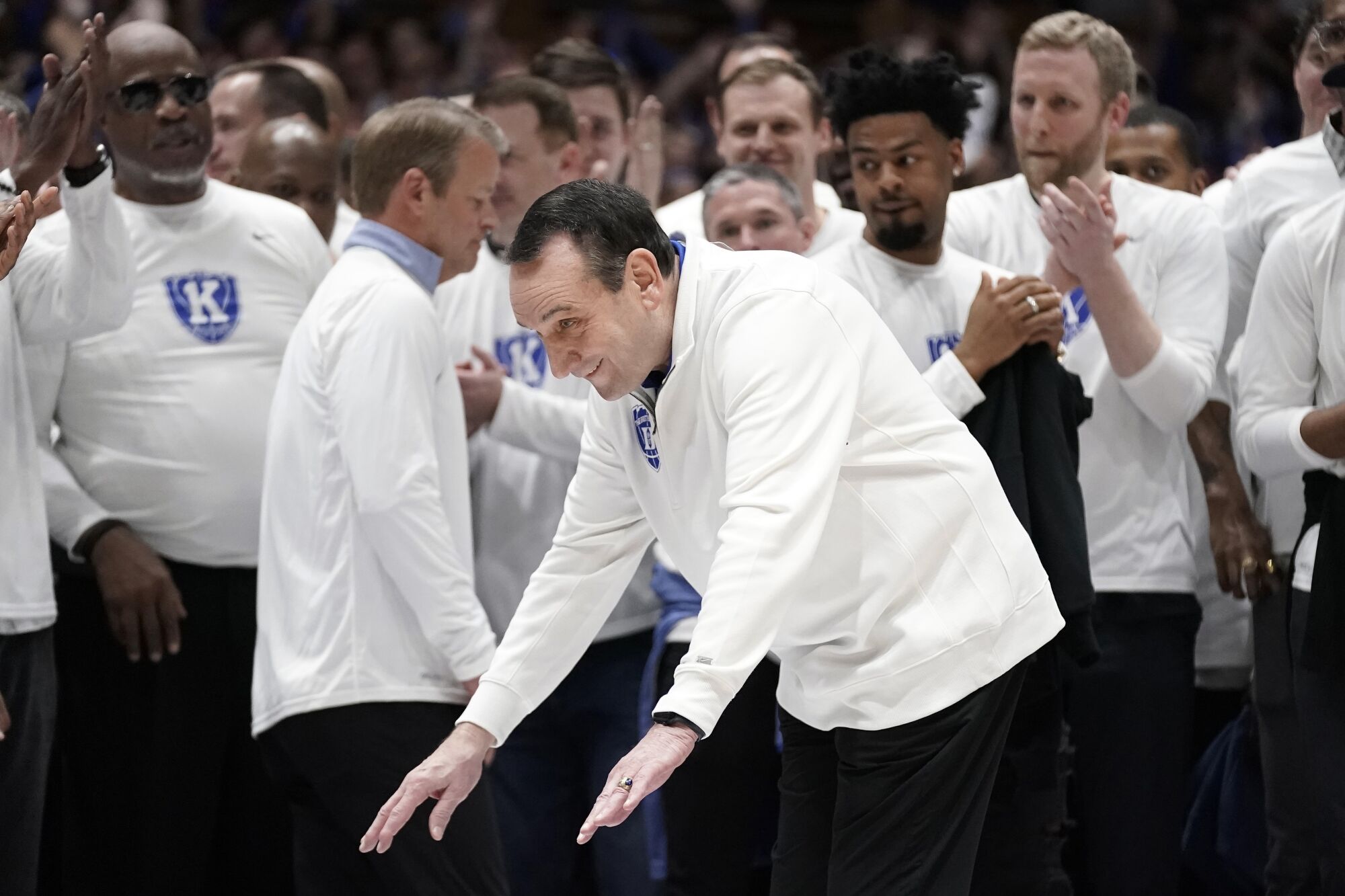 Duke coach Mike Krzyzewski takes a bow while being recognized during a pregame ceremony Saturday.