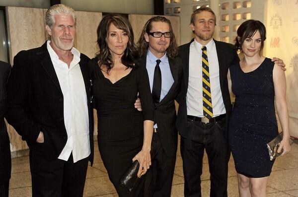 "Sons of Anarchy" creator Kurt Sutter, center, poses at the "Sons of Anarchy" Season 4 premiere with cast members Ron Perlman, left, Katey Sagal, Charlie Hunnam and Maggie Siff at the Arclight Cinerama Dome in Los Angeles. The outlaw biker series premiere is set to air on the FX Network on Sept. 6.