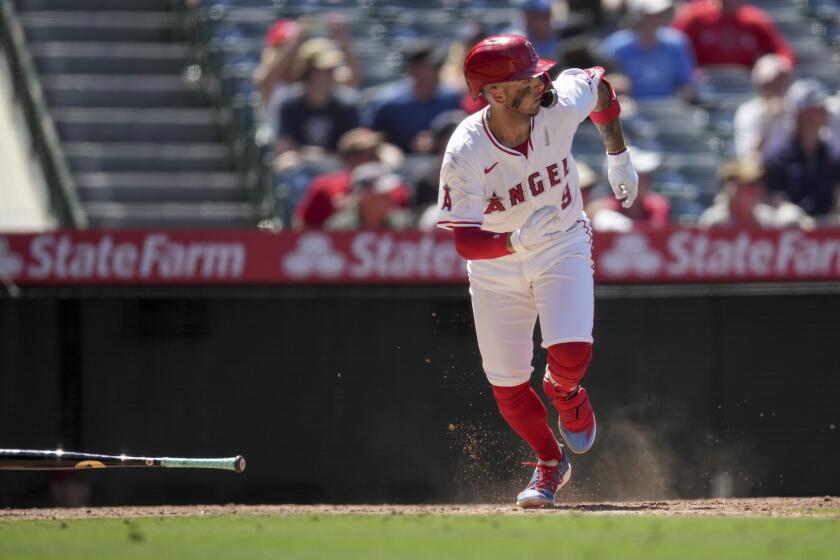 Los Angeles Angels' Zach Neto watches his two-run double against the Oakland Athletics during the sixth inning of a baseball game in Anaheim, Calif., Wednesday, June 26, 2024. (AP Photo/Eric Thayer)