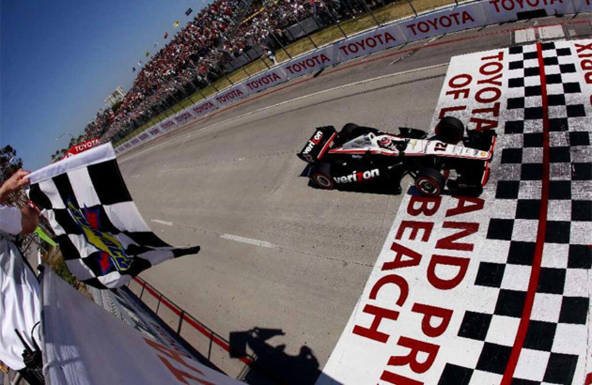 The Toyota Grand Prix of Long Beach is tightening security for this weekend's event. Pictured: Will Power, last year's winner, takes the checkered flag.