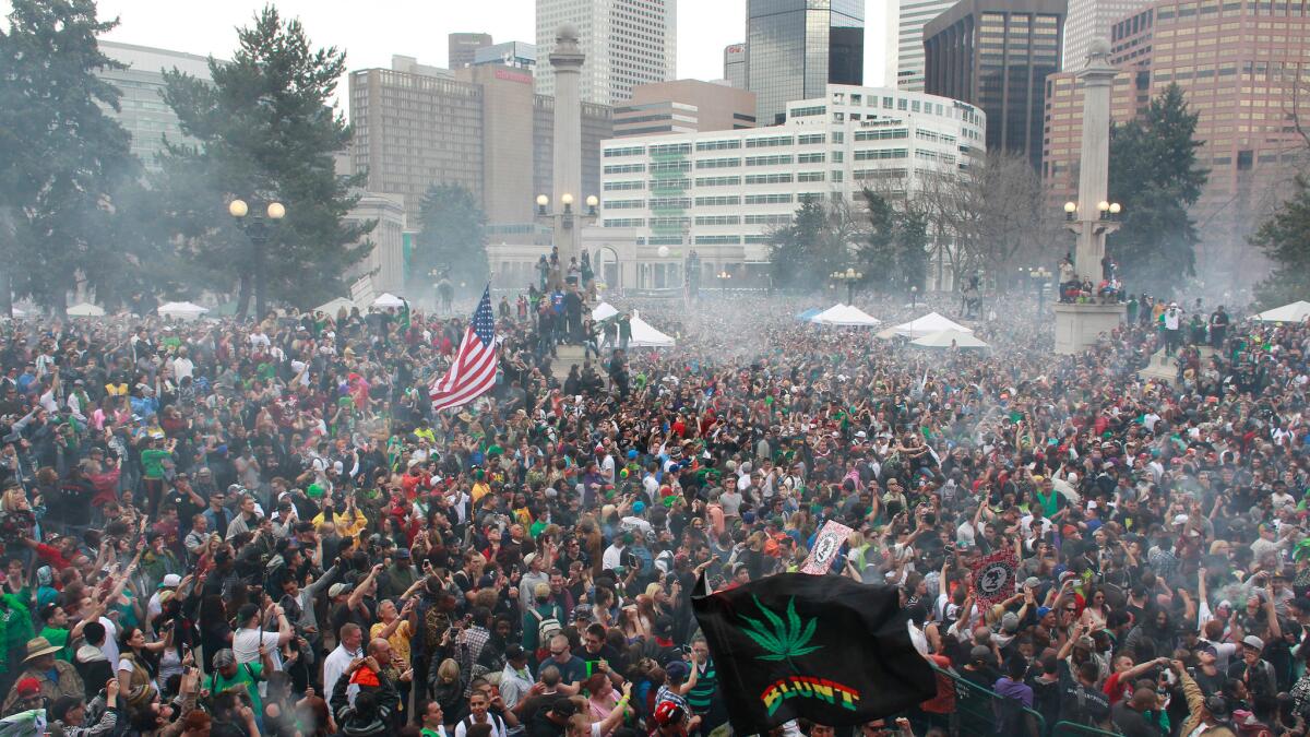 Thousands of people gather at a pro-marijuana rally in Denver's Civic Center Park in 2013. Denver police have said they would potentially use social media tracking software to monitor the annual gathering.