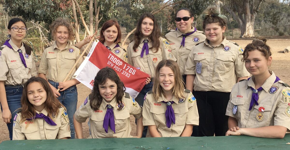 Female members of Scouts BSA Troop 1768 are planning scuba-diving, snow sports and movie-making activities.