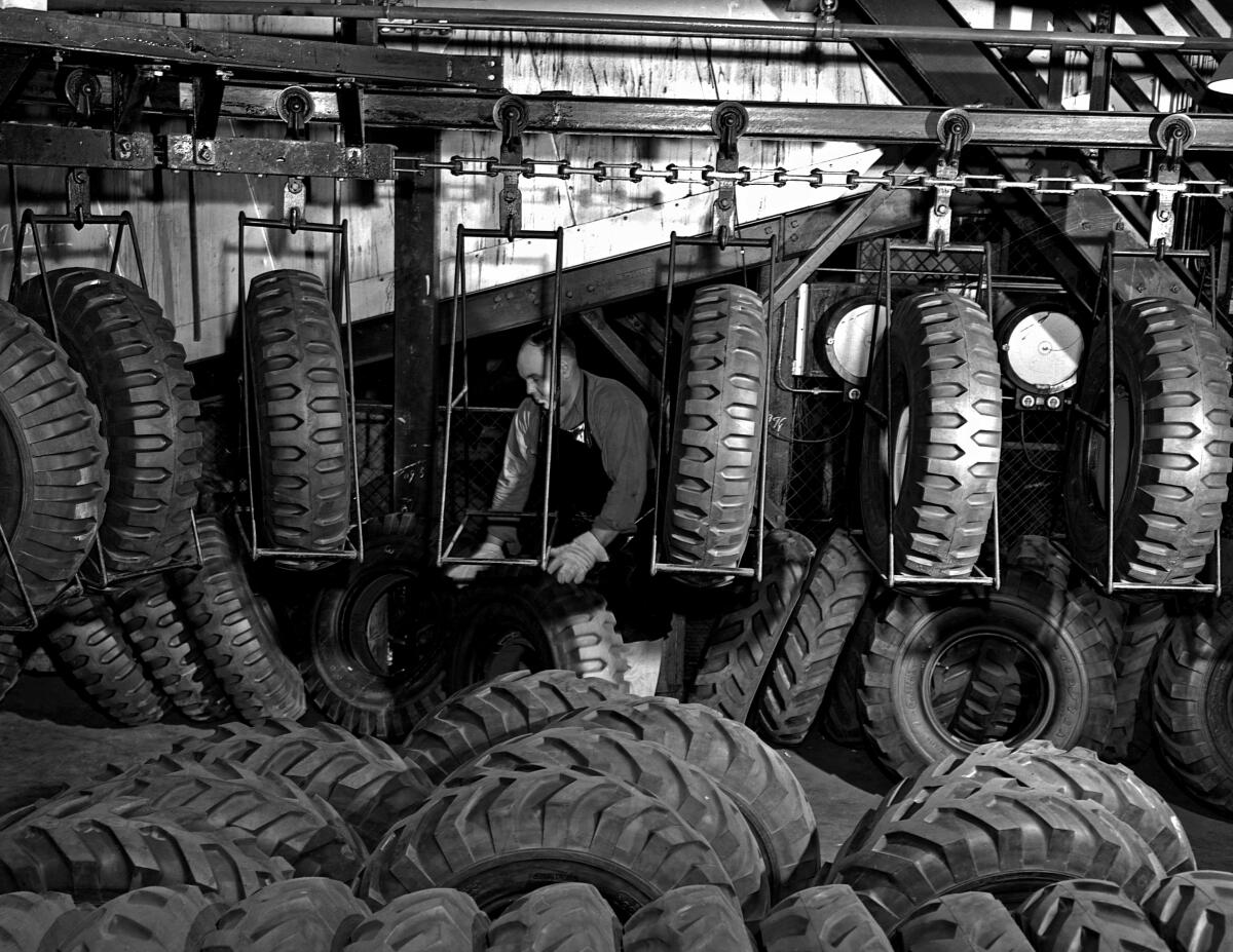 A worker at a Dodge plant converted to produce trucks for the U.S. Army in August 1942.