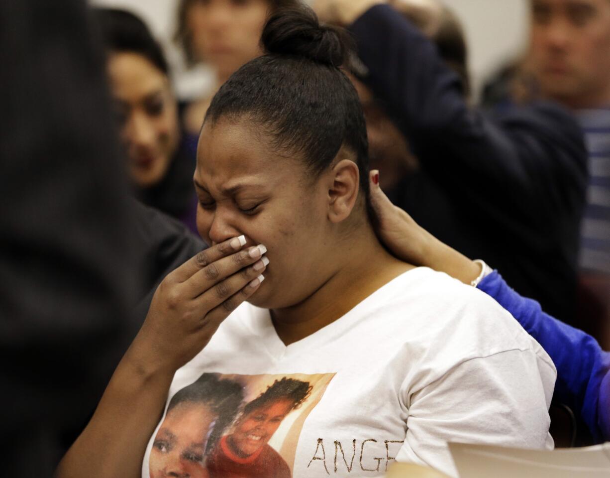 Nailah Winkfield, mother of 13-year-old Jahi McMath, cries before a courtroom hearing regarding McMath, on Dec. 20, 2013, in Oakland.