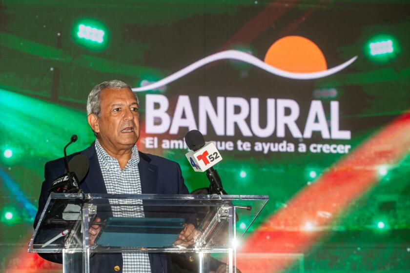 Los Angeles, CA - August 16: Juan Luis Fonseca , general manager of Banrural, speaks at a press conf