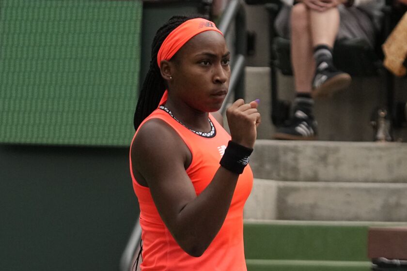 Coco Gauff reacts after winning a point against Rebecca Peterson, of Sweden, at the BNP Paribas Open tennis tournament Tuesday, March 14, 2023, in Indian Wells, Calif. (AP Photo/Mark J. Terrill)