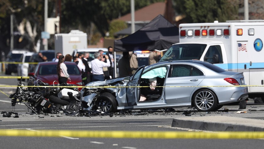 L.A. County sheriff's deputies investigate the scene of a crash that killed a motorcycle deputy.