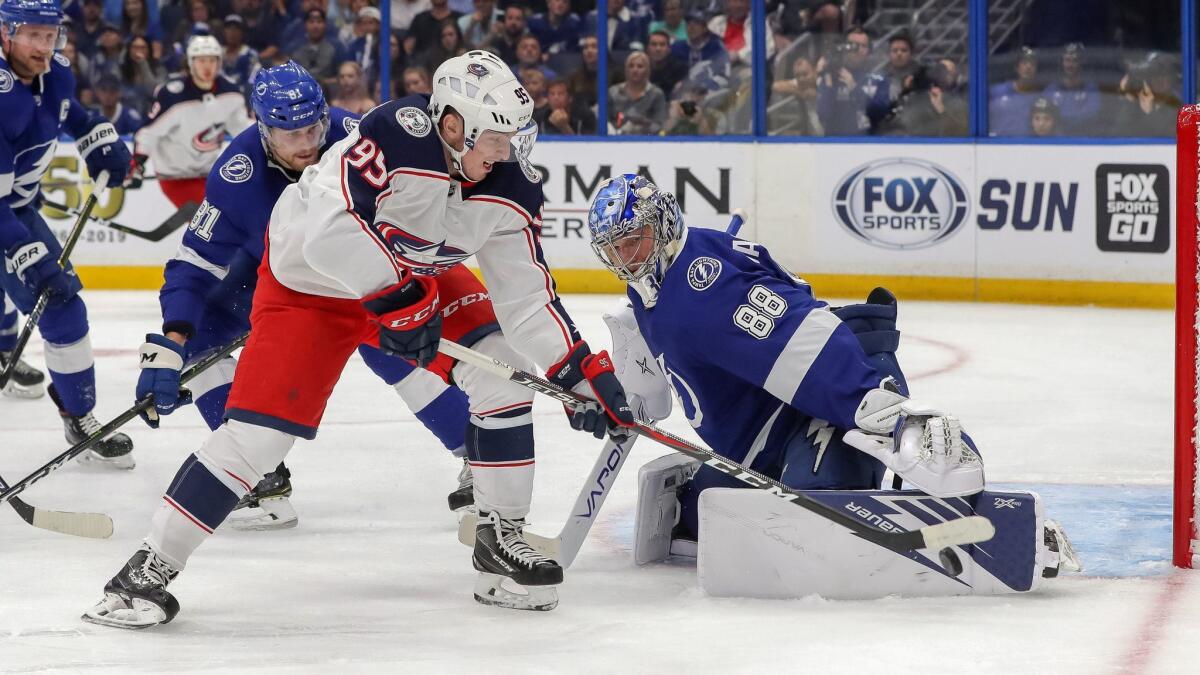 Tampa Bay Lighting's Andrei Vasilevskiy (88) makes a save against Columbus Blue Jackets' Matt Duchene (95) during the first period in Game 2 of the Eastern Conference first round on Friday.