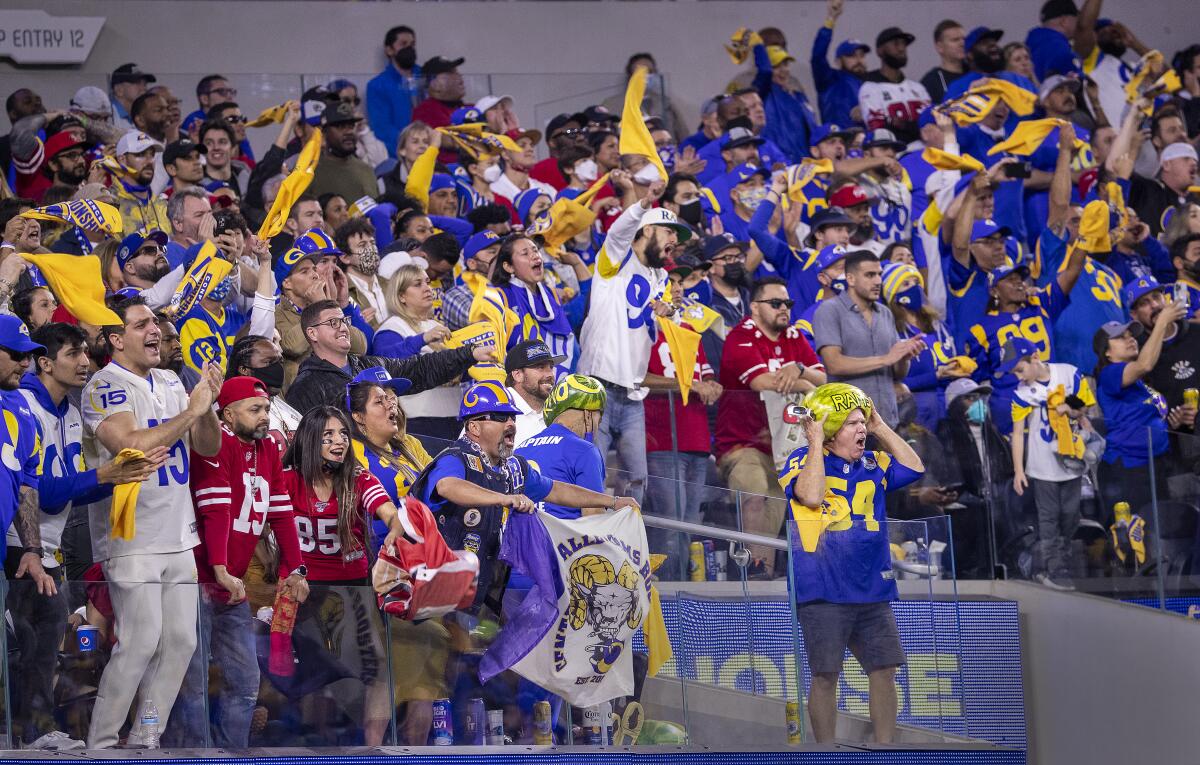 Rams fans cheer during their 20-17 victory over the 49ers