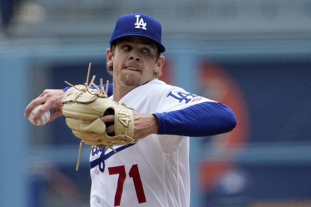 Dodgers starting pitcher Gavin Stone winds up to pitch.