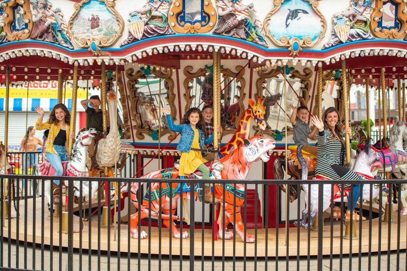 The carousel at Belmont Park appeals to those of all ages.