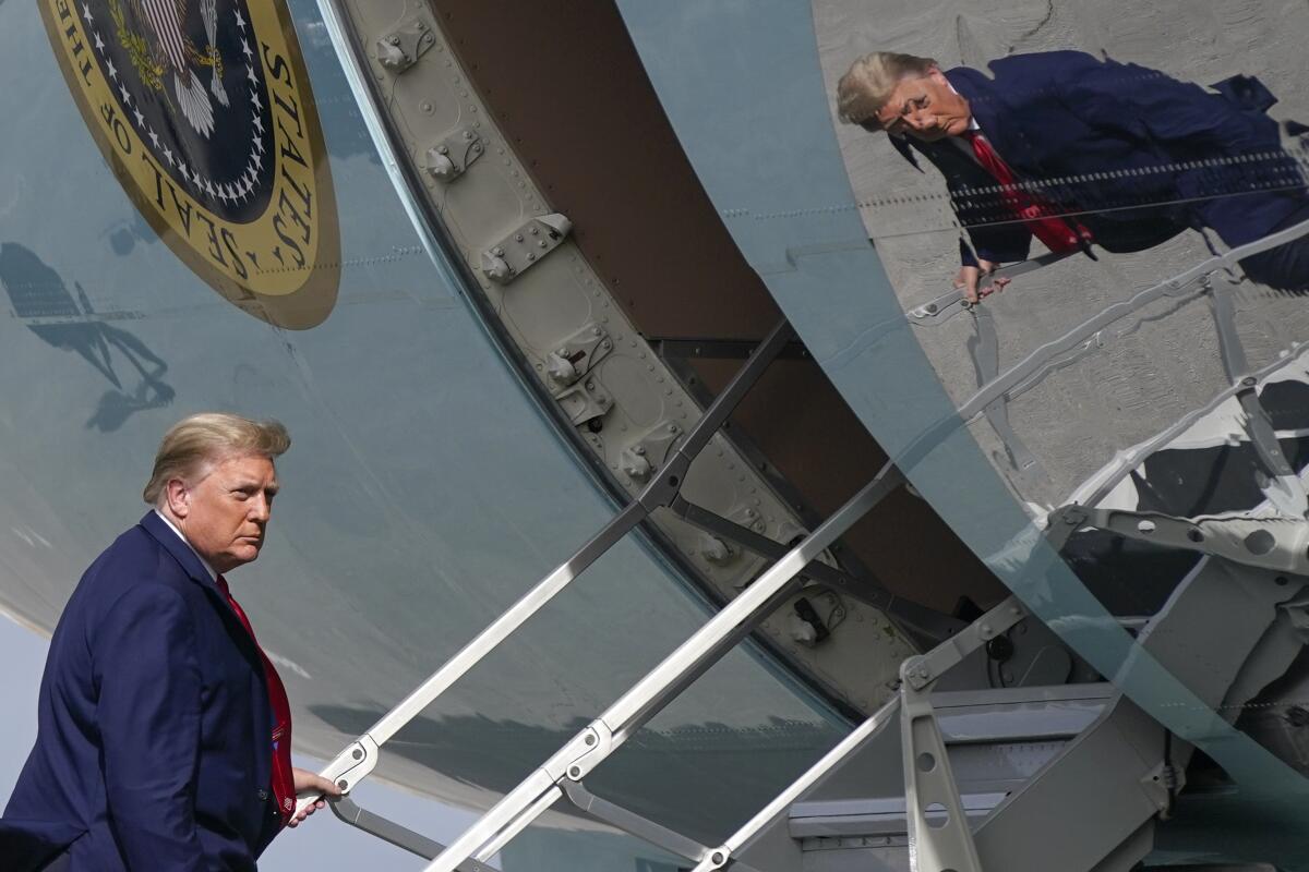 President Trump boards Air Force One at Palm Beach International Airport