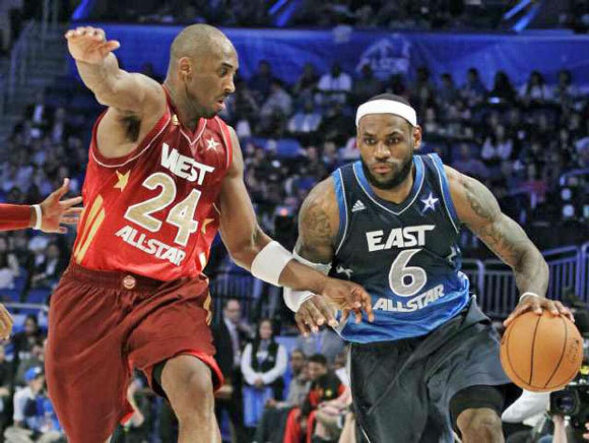 Kobe Bryant guards LeBron James at the All-Star game.