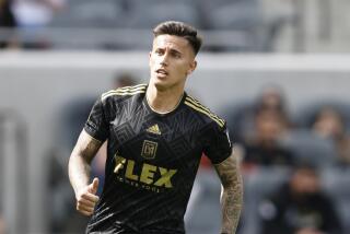 LAFC's Brian Rodríguez runs down field against the Colorado Rapids during an MLS match Feb. 26, 2022.