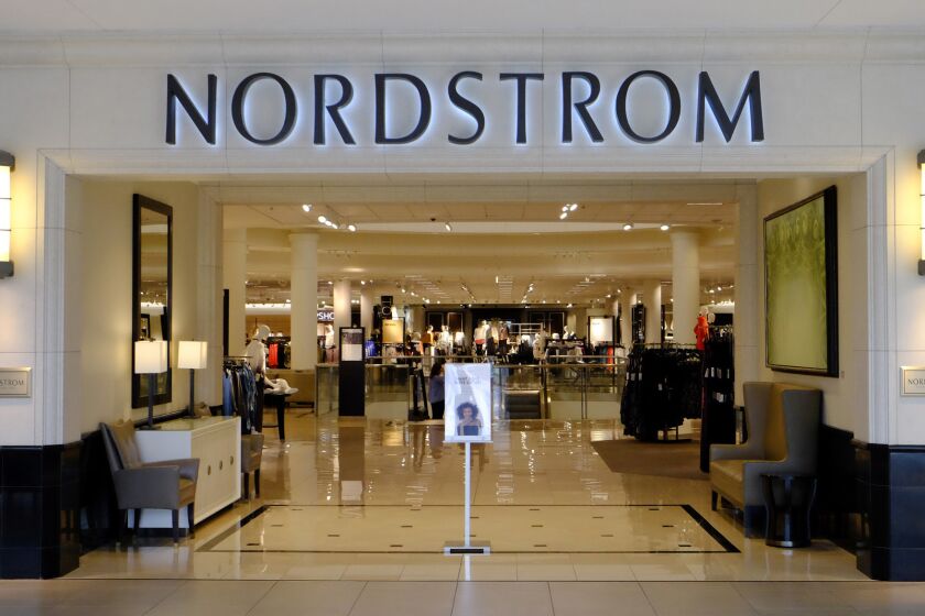 FILE - In a Wednesday, Aug. 23, 2017 file photo, shoppers enter a Nordstrom store, in Indianapolis. Nordstrom says it has ended buyout talks with family members of the company's founder, saying that it couldn't get the group to raise its price. Earlier in March 2018, the department store operator rejected an offer from the Nordstrom family members to pay $50 in cash for each share, in a deal that would have taken the company private. Taking the company private would have paved the way for the Seattle-based chain to manage its reinvention without the watch of the public markets. (AP Photo/Darron Cummings, File)