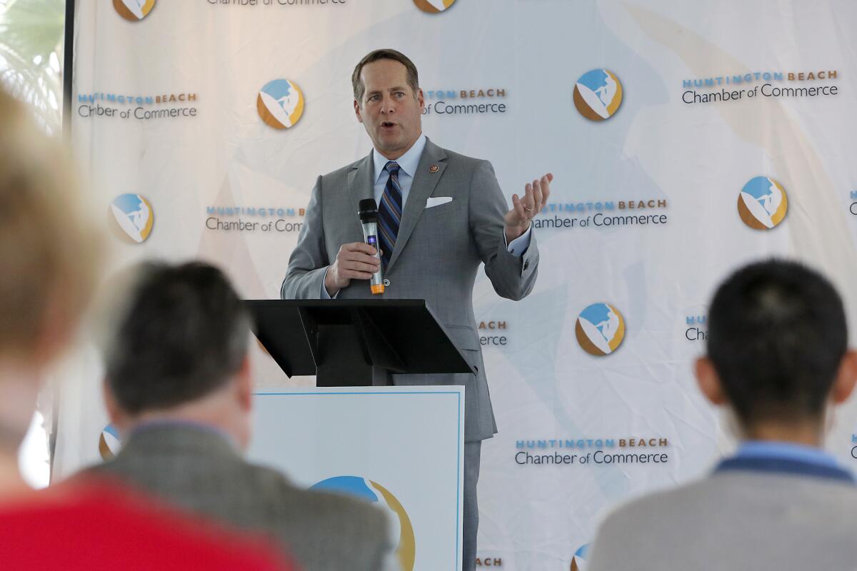 U.S. Rep. Harley Rouda (D-Laguna Beach) speaks during the State of the County meeting at Pacific City in Huntington Beach on Friday.