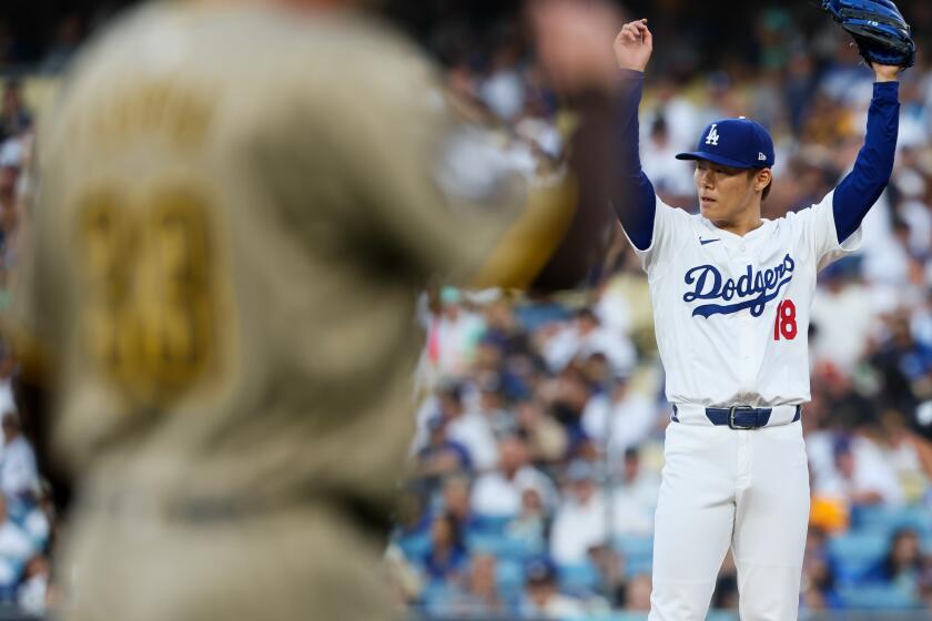 LOS ANGELES, CALIFORNIA - OCTOBER 05: Yoshinobu Yamamoto #18 of the Los Angeles Dodgers.