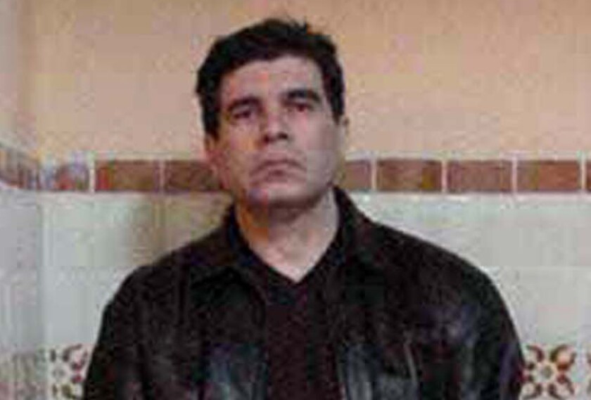 A March 9, 2002 file photo provided by the office of Mexico's attorney general shows drug trafficker Benjamin Arellano Felix.