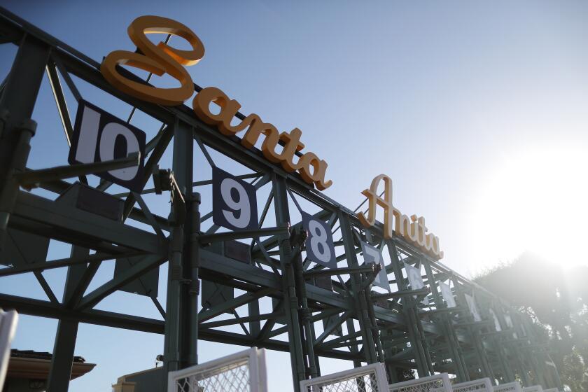 ARCADIA, CALIFORNIA - JUNE 23: A starting gate stands outside the track on the final day.