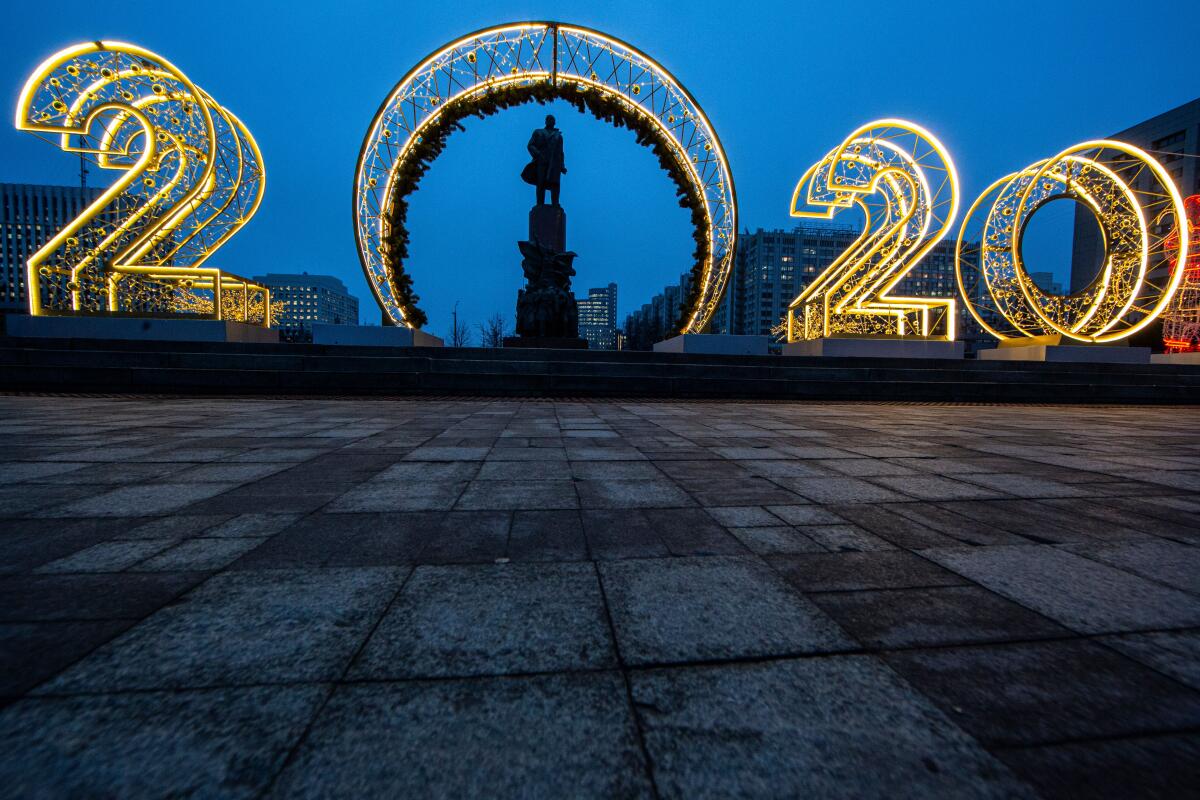 New Year's decorations surround the monument to Lenin in Moscow.