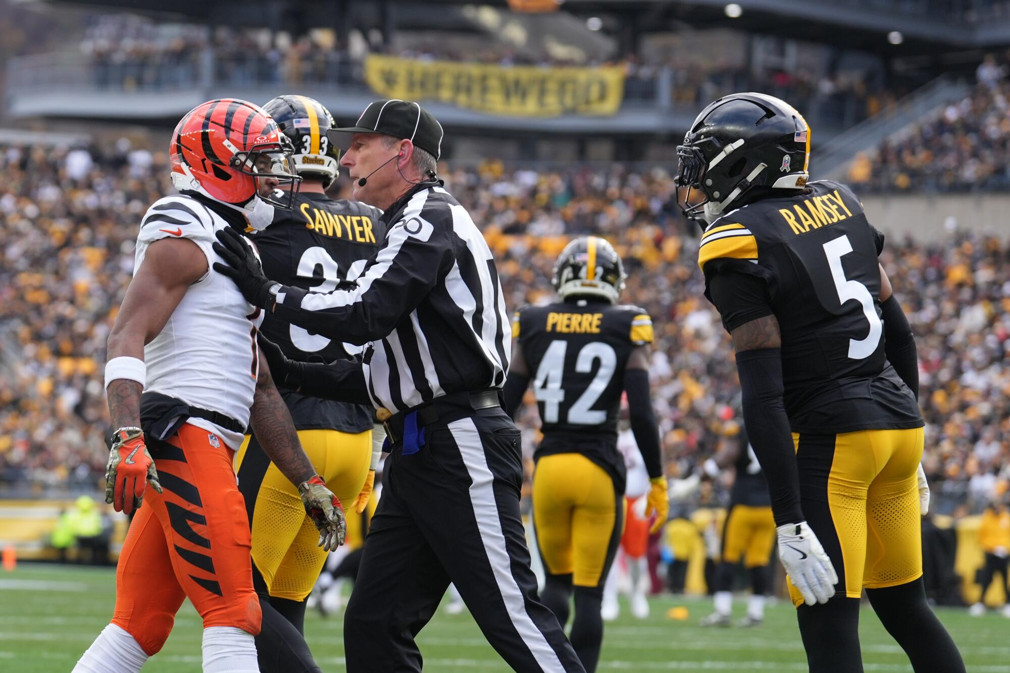Appeal denied: Ja'Marr Chase to sit for his spit on Jalen Ramsey - Los Angeles Times