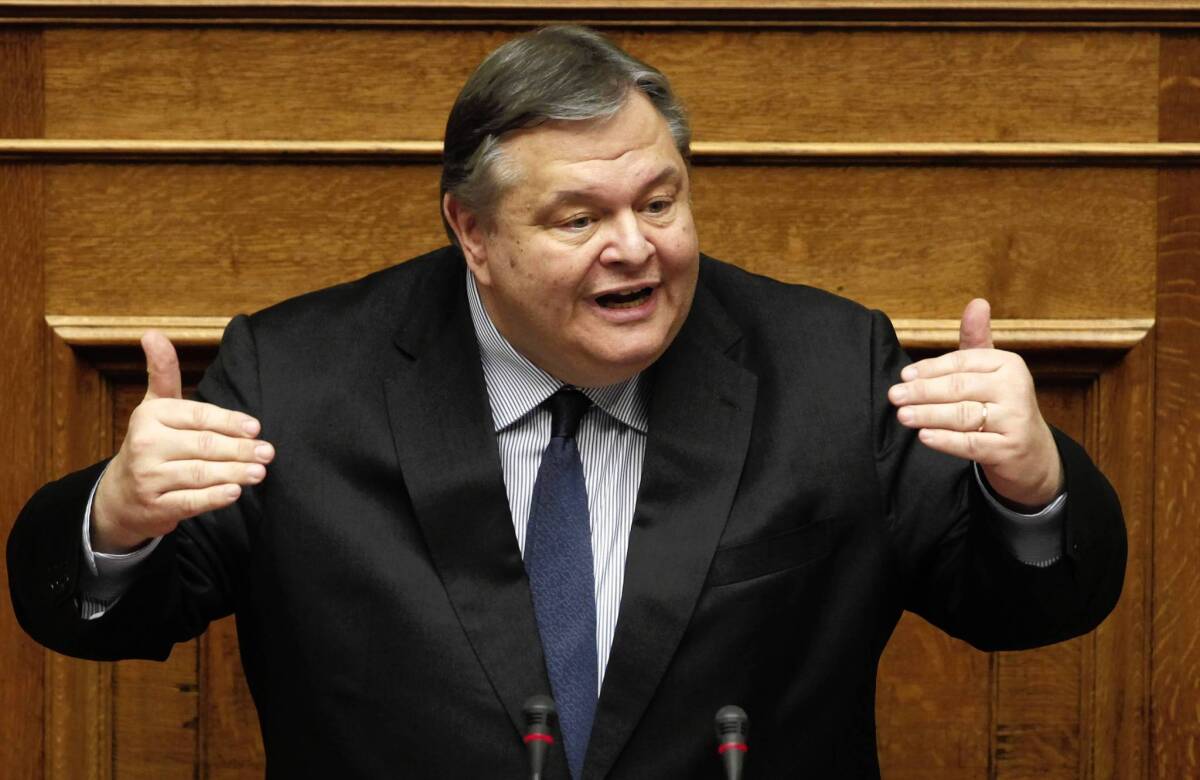 Former finance minister and socialist party leader Evangelos Venizelos addresses the Greek Parliament in Athens on Thursday during the date on whether whether to investigate four former senior members of the government in connection with a tax scandal.