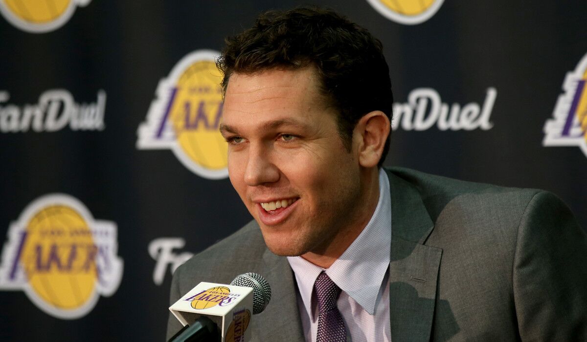 New Lakers Coach Luke Walton answers questions during a news conference Tuesday at the team's training facility in El Segundo.