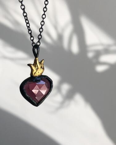 A heart-shaped necklace. 