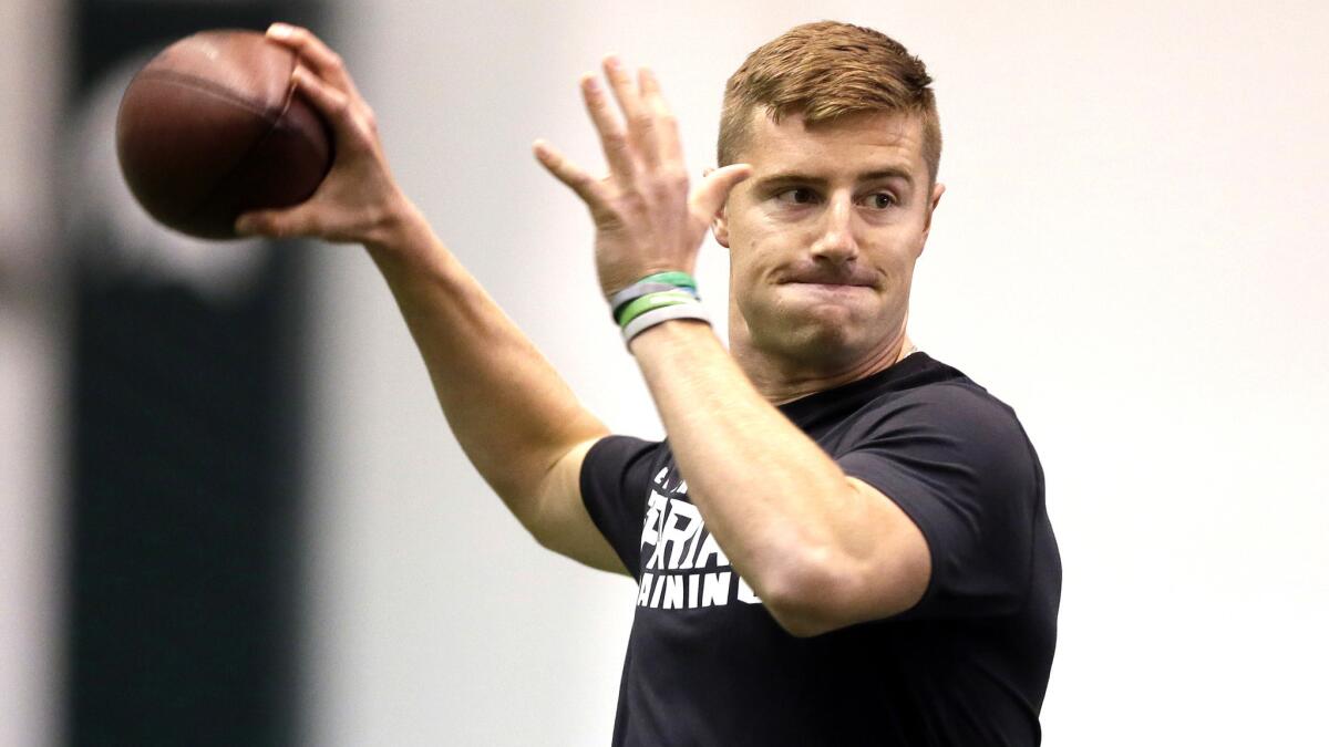 Quarterback Connor Cook throws during a drill for NFL scouts at Michigan State's pro day last month.