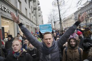 FILE - Russian opposition leader Alexei Navalny, center, attends a rally in Moscow on Sunday, Jan. 28, 2018. During his 24-year rule, Russian President Vladimir Putin has gone from tolerating dissent to suppressing any challenger. Most Russian opposition politicians are in prison or exile. (AP Photo/Evgeny Feldman, File)