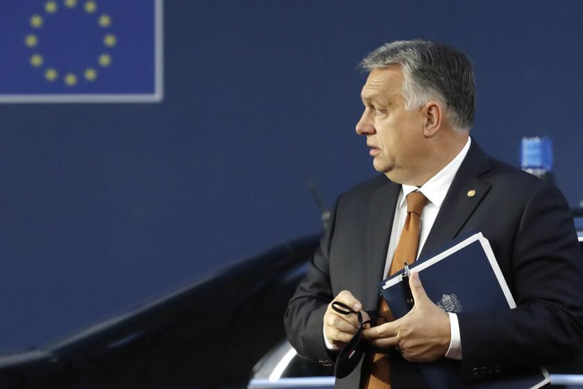 FILE - Hungary's Prime Minister Viktor Orban arrives for an EU summit in Brussels, on Oct. 22, 2021. The European Union wants to impose a new round of sanctions against Russia over its war in Ukraine, but Hungary has emerged as one of the biggest obstacles to unanimous support needed from the bloc’s 27 member nations. (Olivier Hoslet, Pool Photo via AP)
